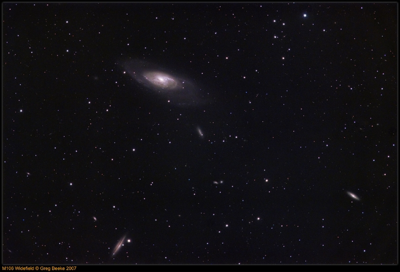 M106_Widefield.jpg - Title: M106 Widefield By: Greg Beeke Widefield view of M106 and companion gallxies.Telescope: TMB152/1200 with AP field flattener (f/8)CCD: Yankee Robotics Trifid2 6303Exp: L=14x300s binned 1x1, RGB=5x150s binned 2x2Guiding:  200mm lens/MX716